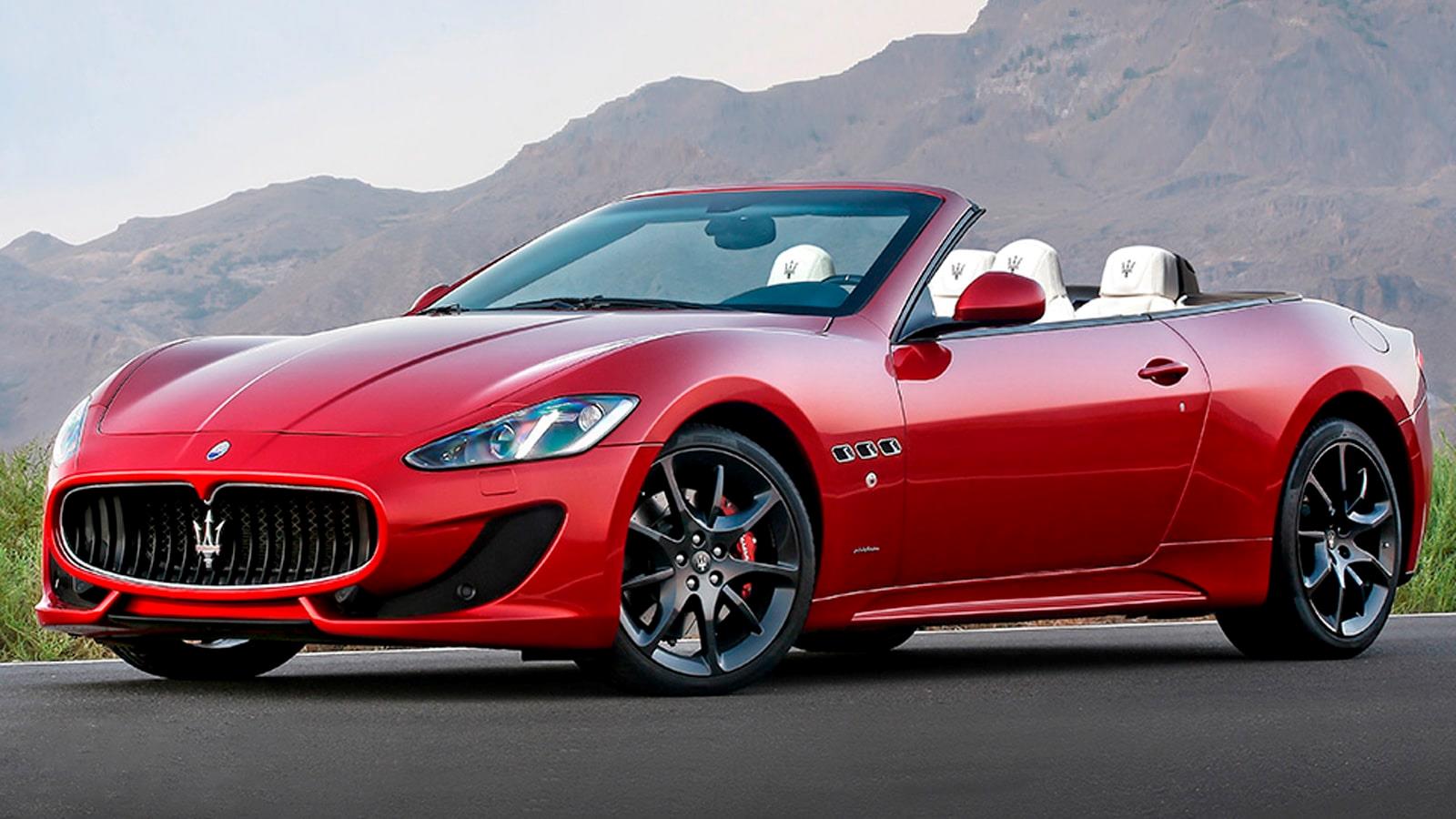 Red convertible Maserati on the road